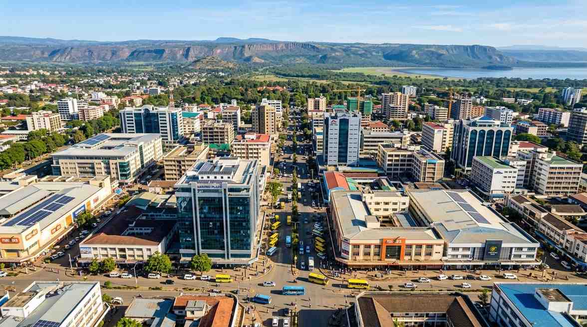 Nakuru City skyline and commercial district with the Rift Valley escarpment in the background